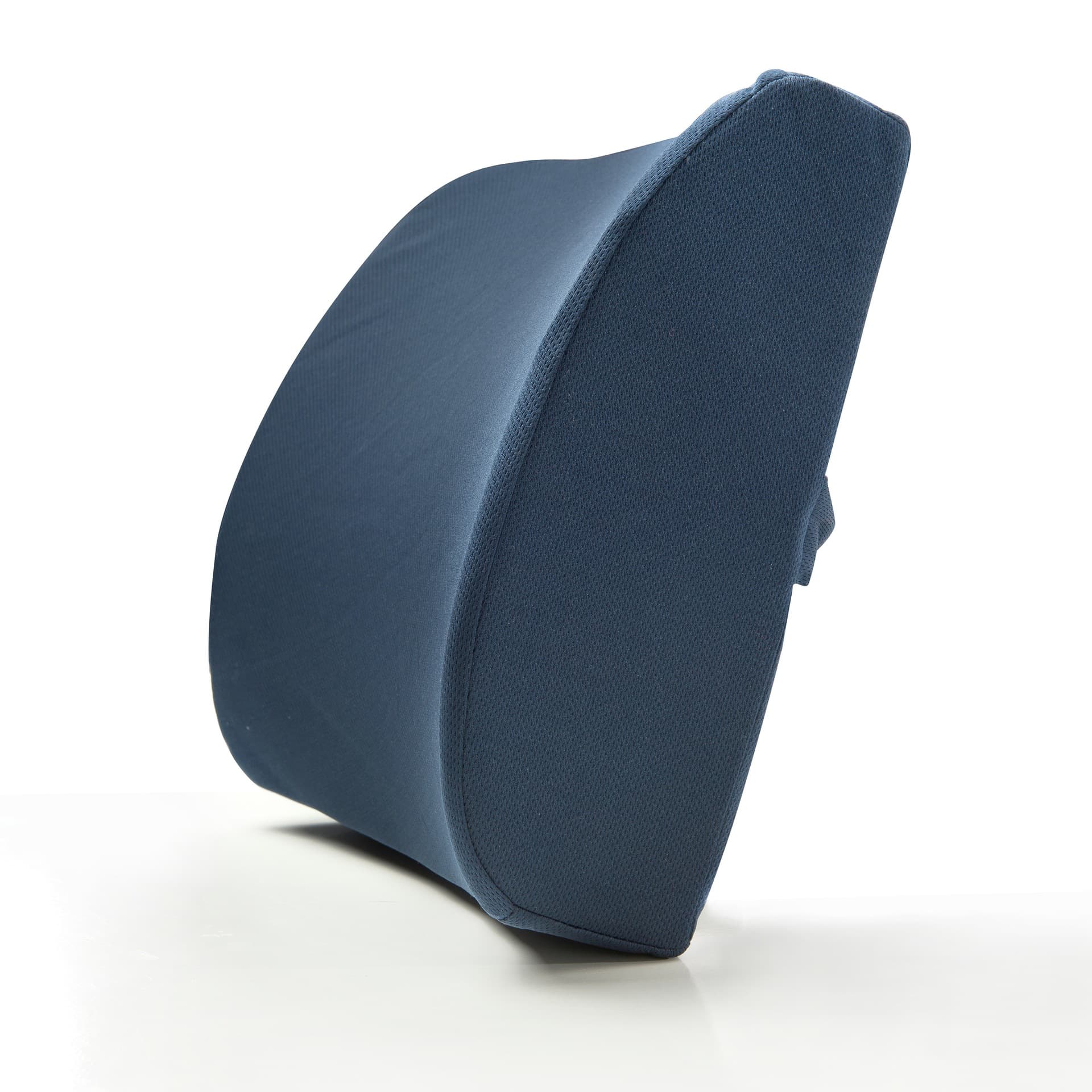 Person easing their lower back after long hours of sitting